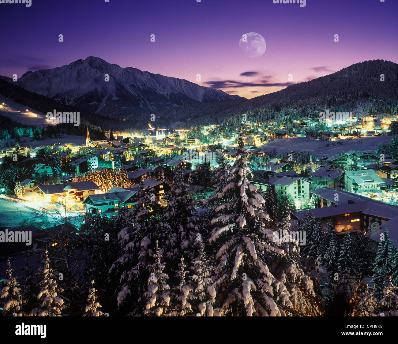 Austria, Europe, Tyrol, Seefeld, tourism, travel, winter evening, moon, snow, lights, mood Stock Photo
