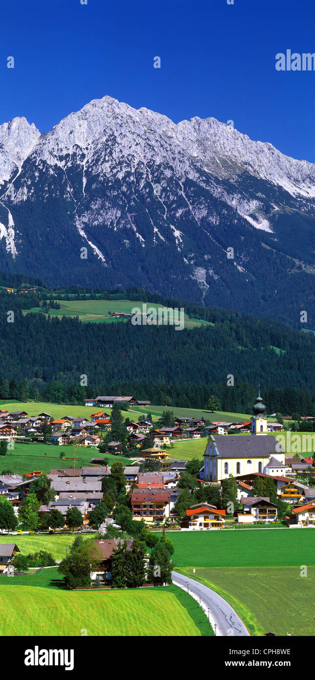 Austria, Europe, Tyrol, lowlands, Söll, high, panorama, scenery, summer, village, place, houses, homes, church, meadows, mountai Stock Photo