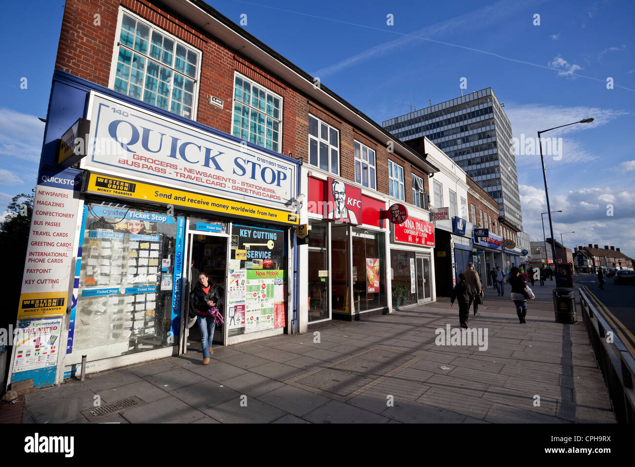 Street scene. Row of shops on Edgware, Middlesex, England, UK Stock