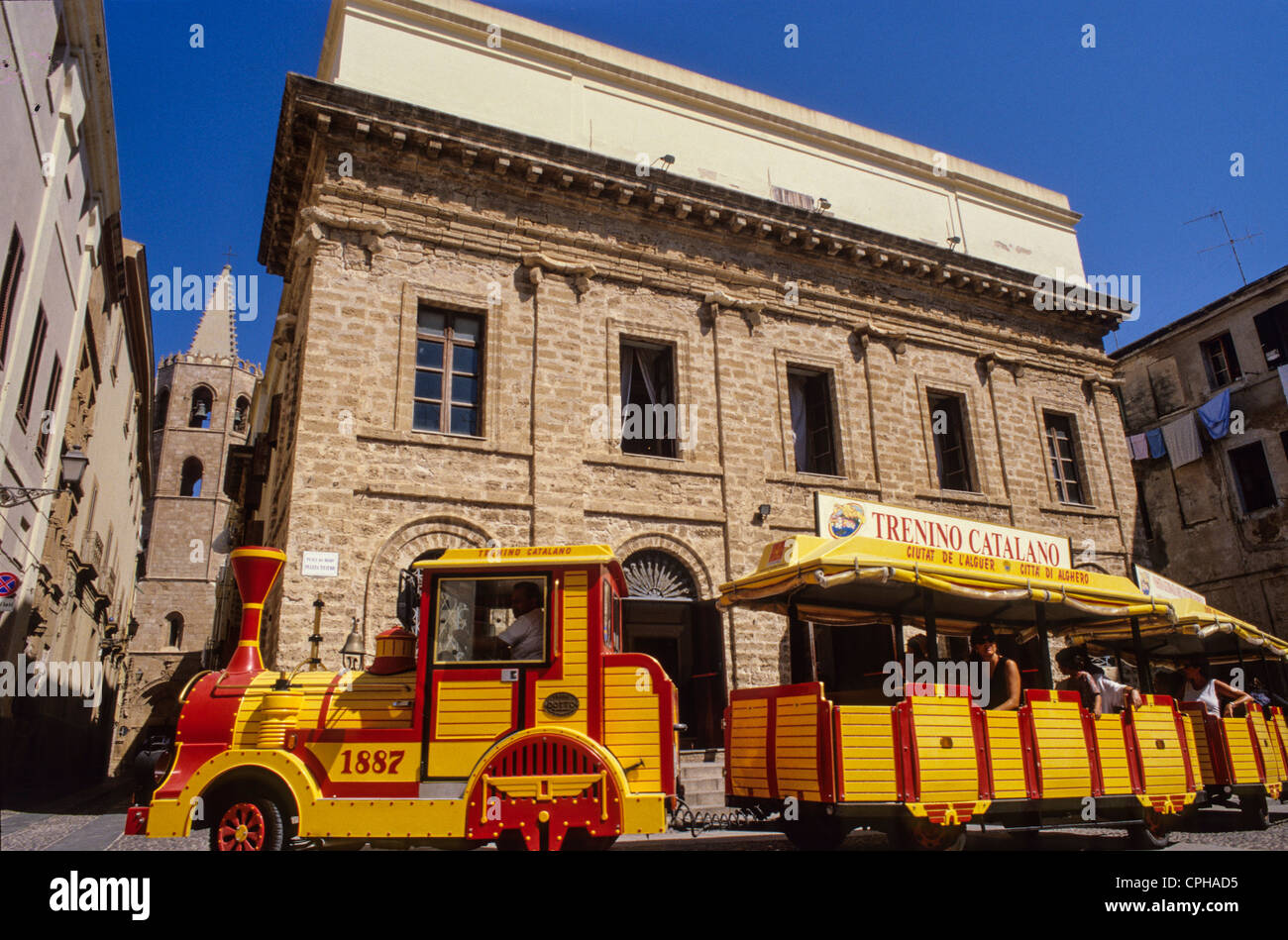 Europe Italy Province of Sassari Sardinia Alghero Catalan train in Piazza Vittorio Emanuele II Stock Photo