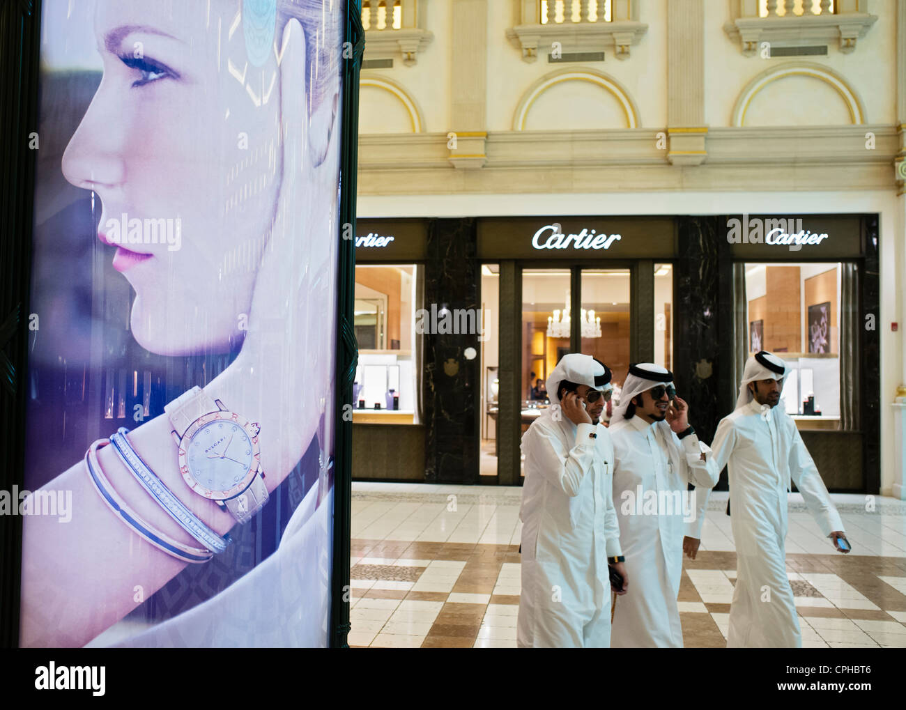 Western advertising billboard in upmarket modern Villaggio Mall in Doha Qatar Stock Photo