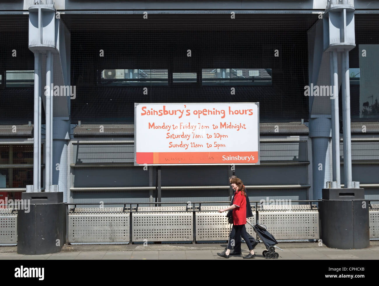 sainsbury's opening times sign, using comic sans style typeface, camden