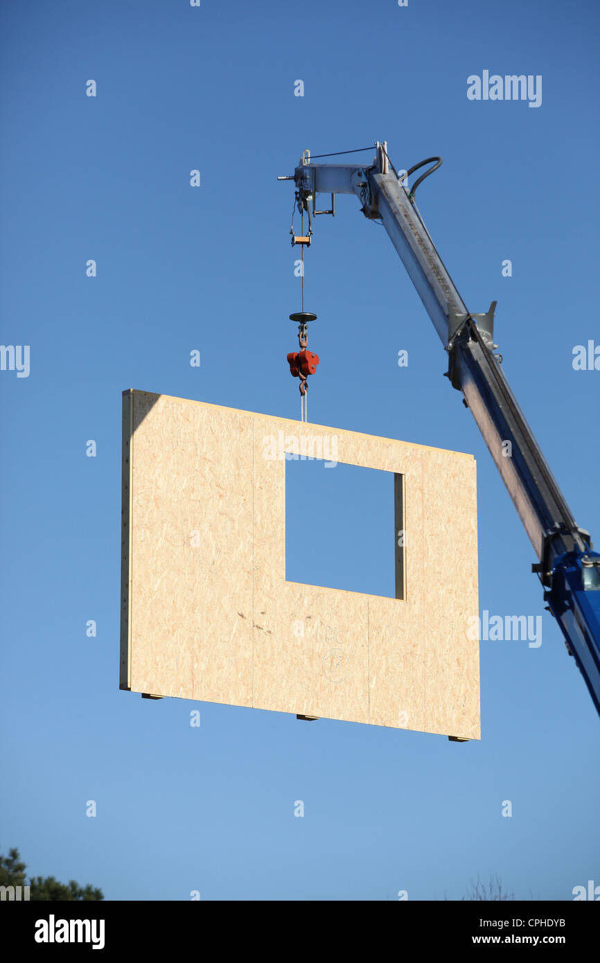 Crane lifting precast wall Stock Photo Alamy