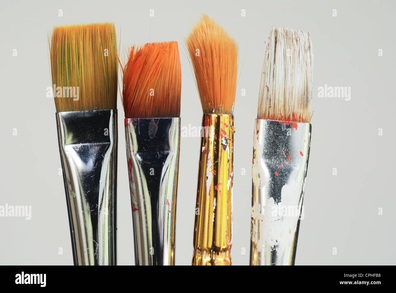 Well Used Artists Paintbrushes On A Blue Background Stock Photo, Picture  and Royalty Free Image. Image 101153104.