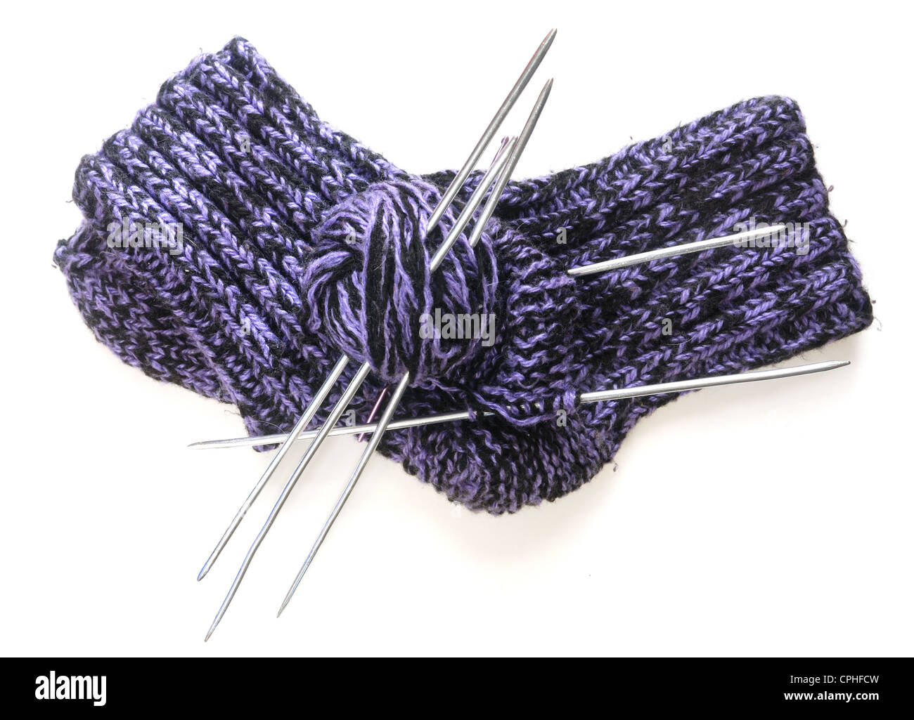 Wool knitted socks, yarn and knitting needles Stock Photo
