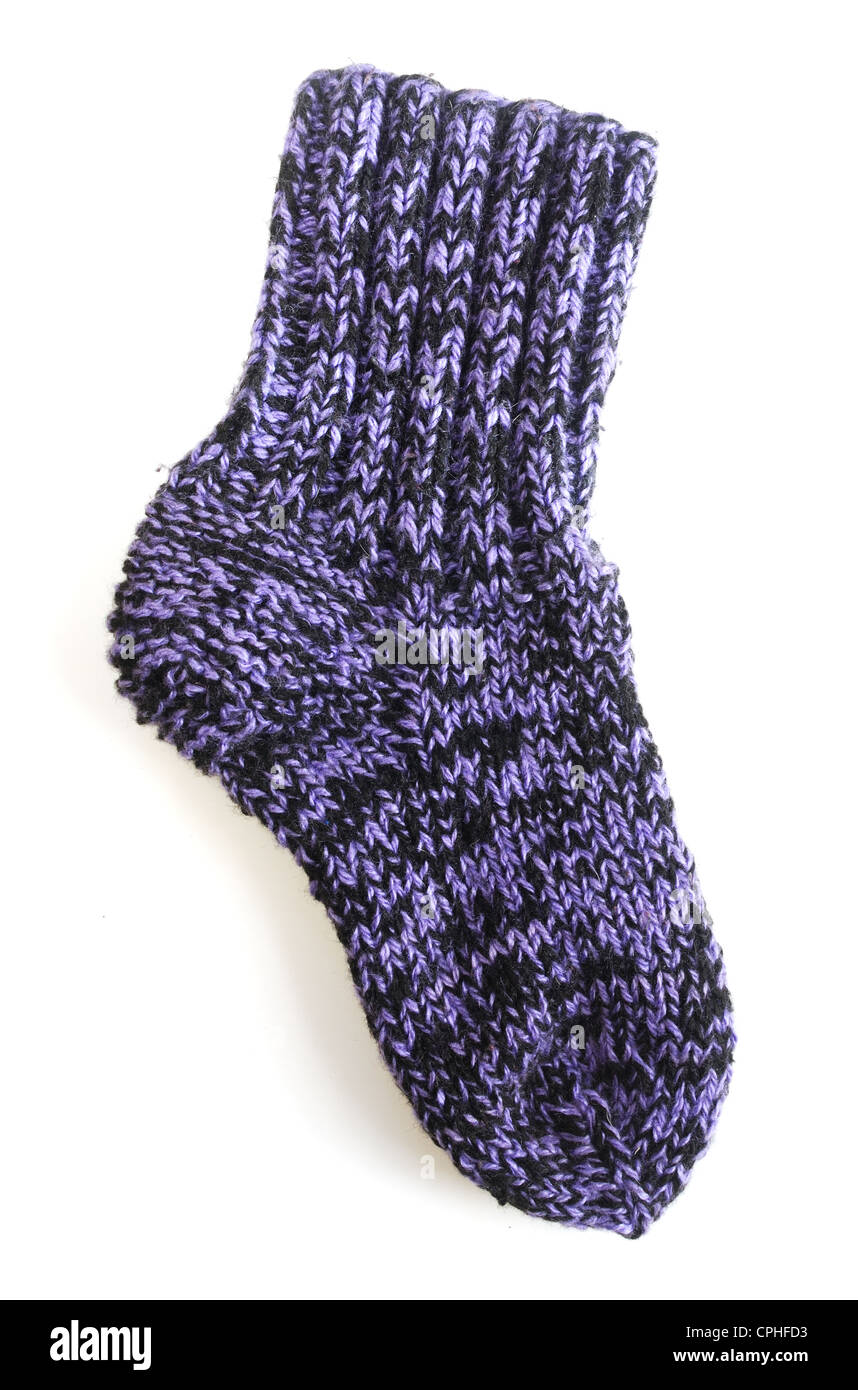 handmade sock in front of a white background Stock Photo