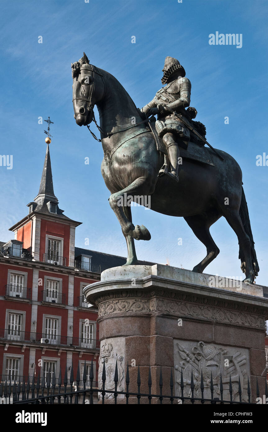 Statue of Philip III with the Casa de la Panaderia in the background in the Plaza Mayor, central Madrid, Spain. Stock Photo