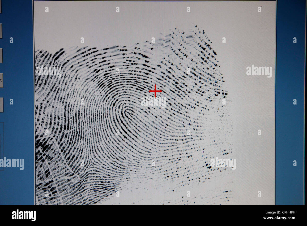 Police, taking fingerprints, digitally from a suspect person. Stock Photo