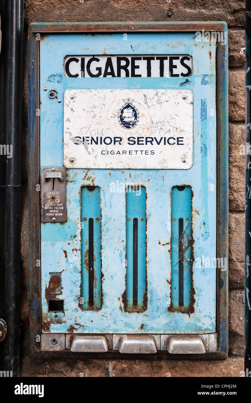 An old wall mounted Players Senior Service cigarette vending machine, Britain. Stock Photo