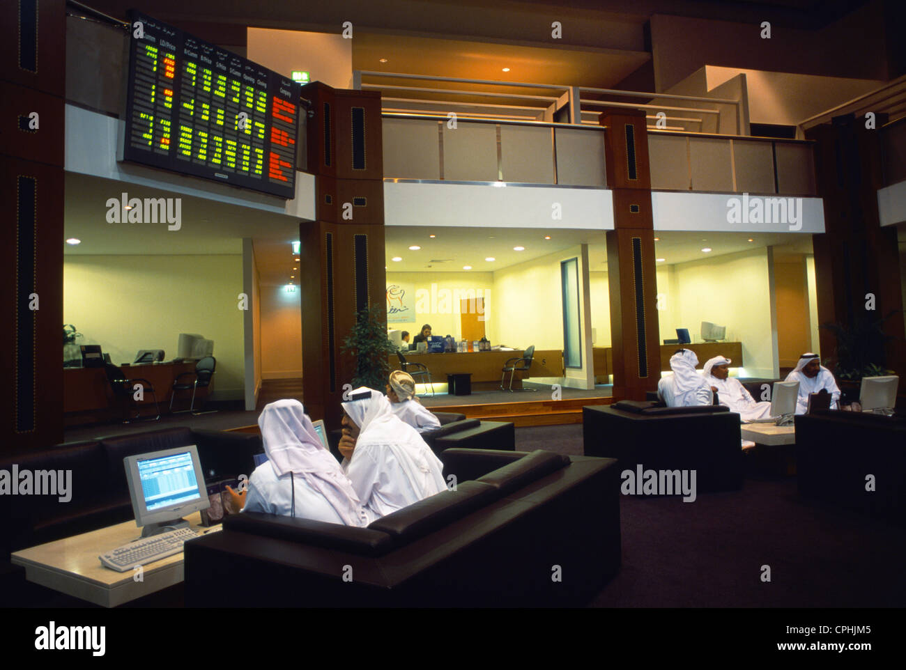 Dubai Uae Financial Market Men On Computers Stock Photo Alamy