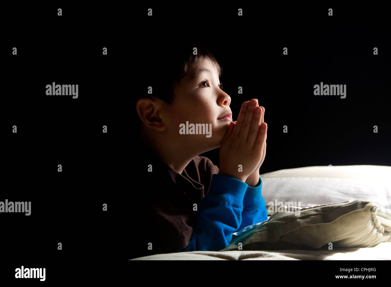 Child praying bedtime hi-res stock photography and images - Alamy