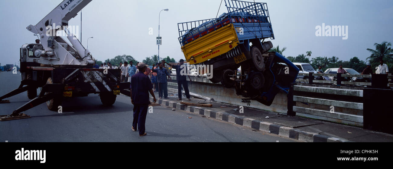 Kerala India Crane Getting Ready To Lift Lorry Up After Crashing Over A