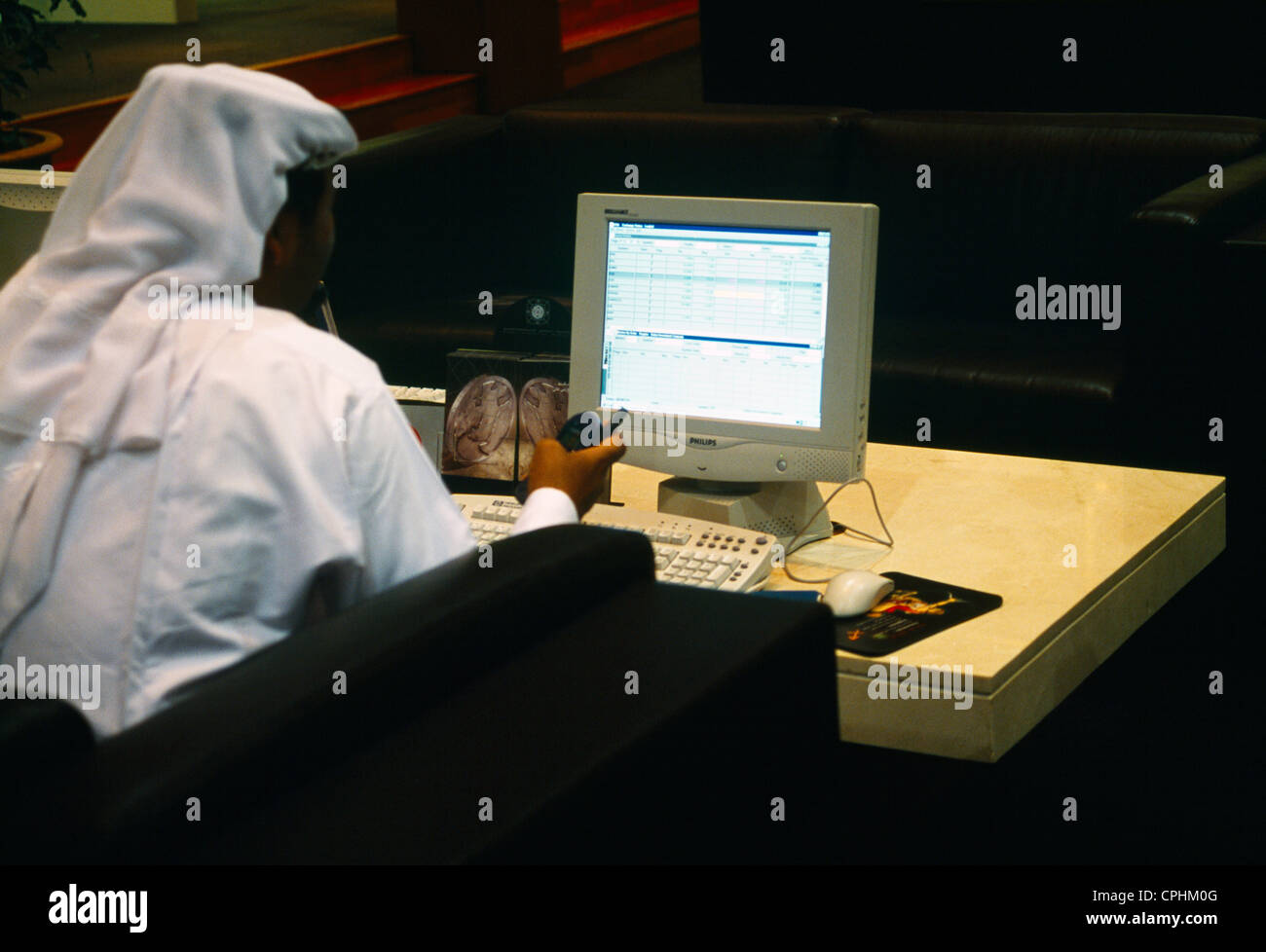 Dubai Uae Financial Market Man On Computer Stock Photo Alamy