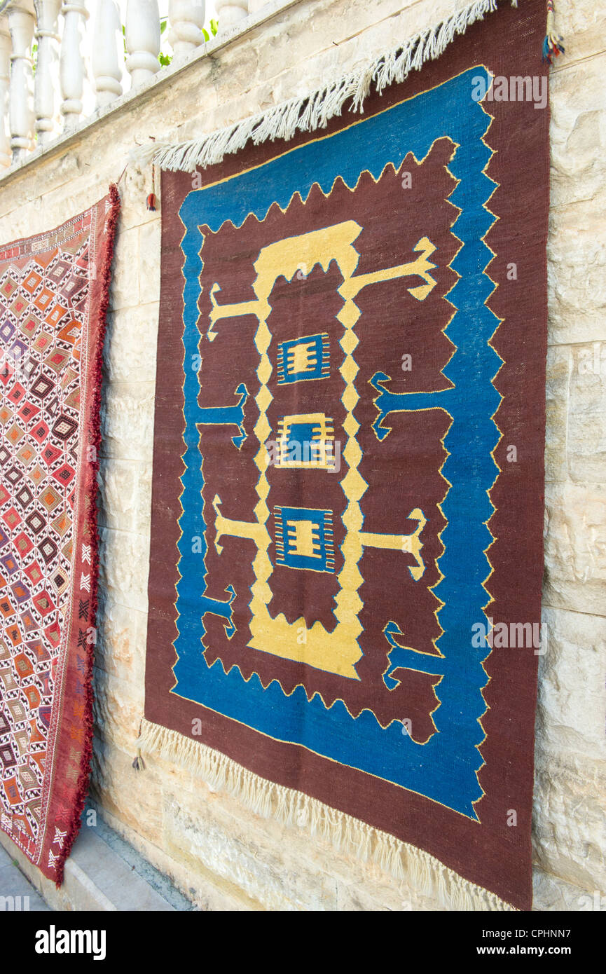 Turkish carpet hanging outdoor at the market Stock Photo - Alamy