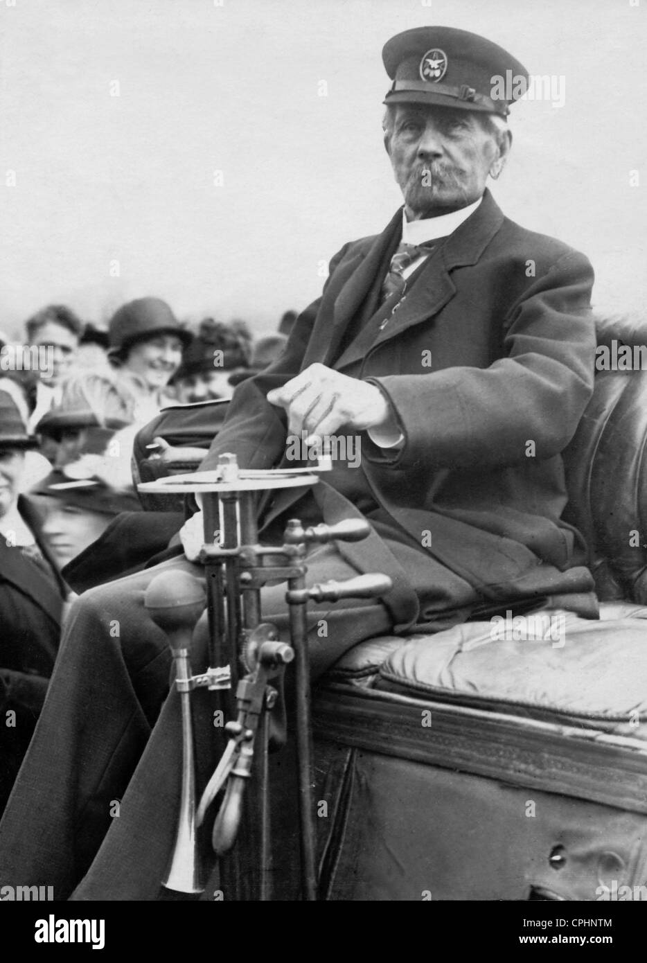 Carl Friedrich Benz in his 1885 Benz-Automobile, 1925 Stock Photo