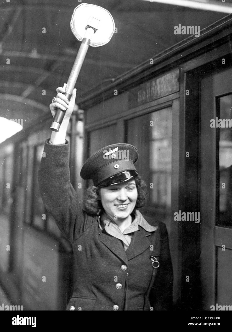 Female train dispatcher at Nollendorfplatz subway station in Berlin, 1940 Stock Photo