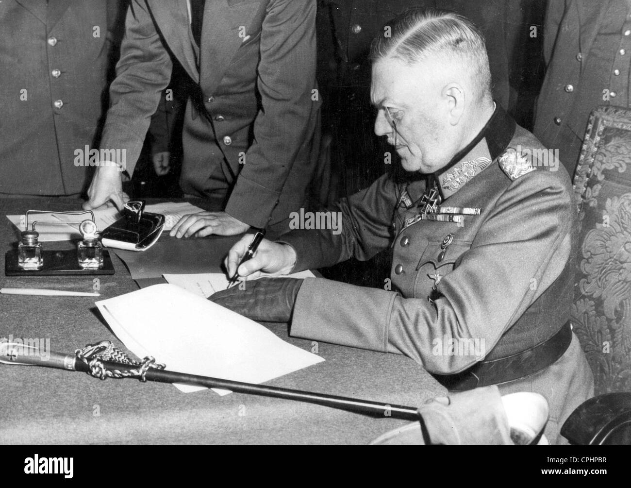 General field marshall Wilhelm Keitel signing the unconditional surrender on behalf of the Wehrmacht in the headquarter of the Stock Photo