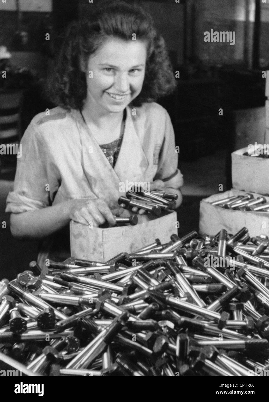 A Woman in a Screw Factory, 1944 Stock Photo