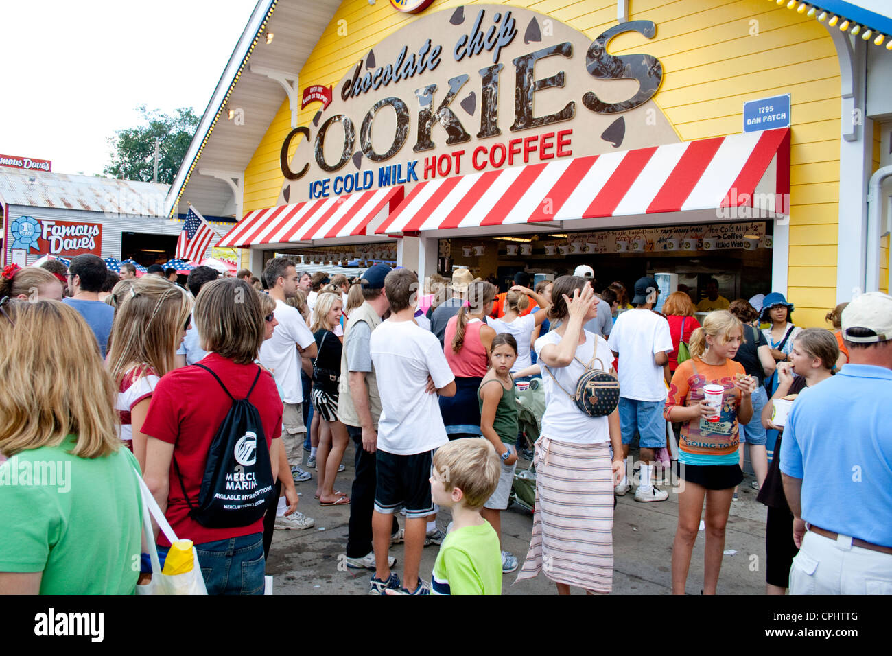 Long lines waiting at the chocolate chip cookies shop along with milk and coffee. Minnesota State Fair St Paul Minnesota MN USA Stock Photo