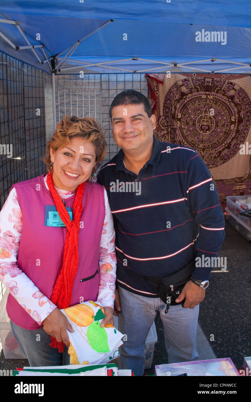 Mexican American entrepreneurs in their sidewalk art shop. Mexican Independence Day Minneapolis Minnesota MN USA Stock Photo