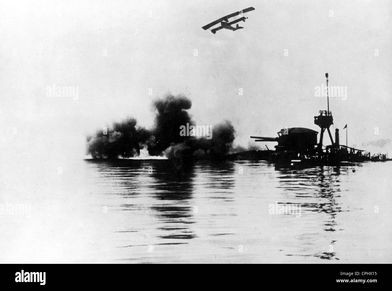 Austrian airplane over a sunken Italian warship, 1917 Stock Photo