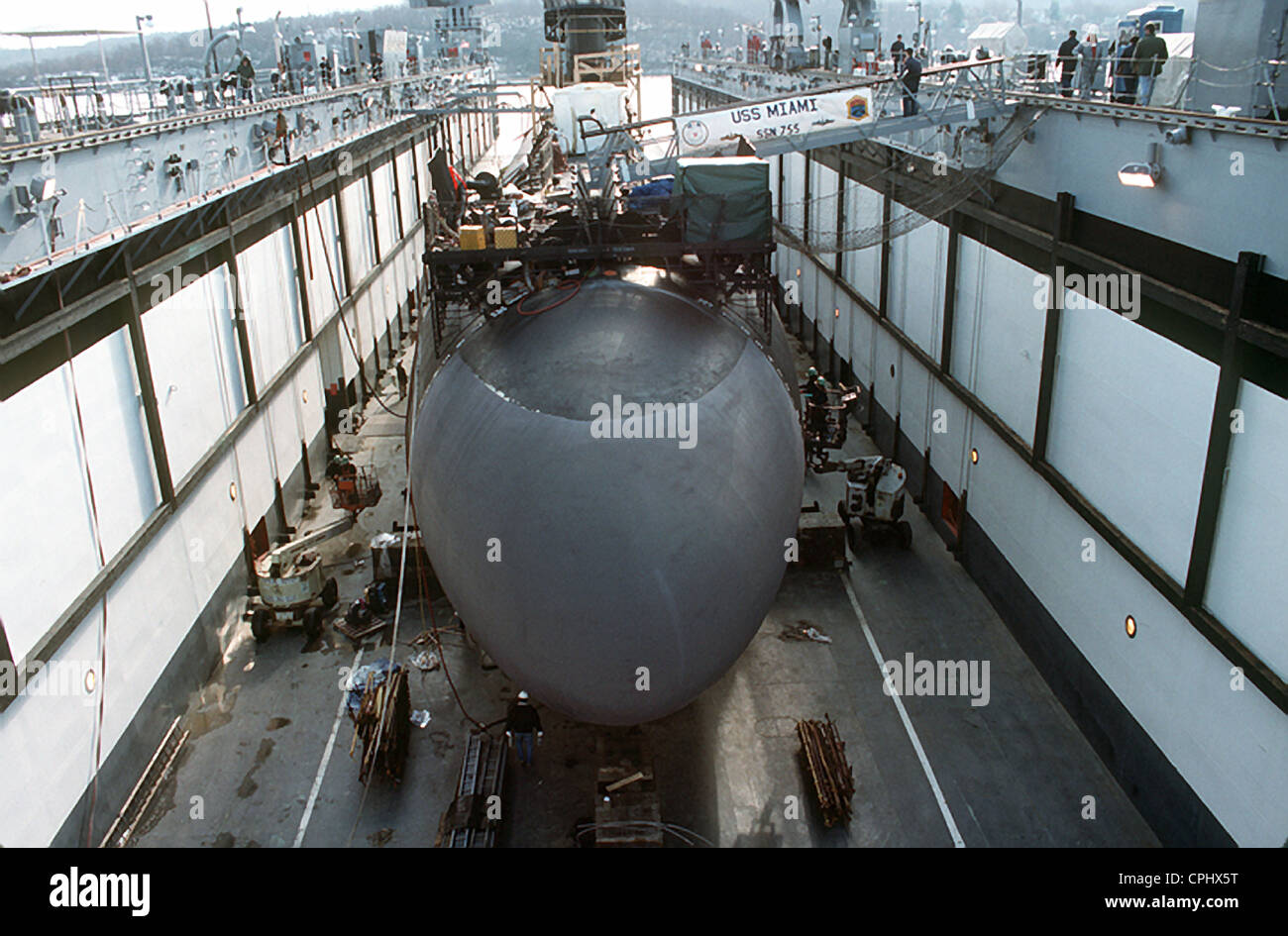 The Los Angeles-class nuclear powered fast attack submarine USS Miami (SSN 755) in dry dock during a routine hull inspection March 16, 1994 in Groton, CT. Stock Photo