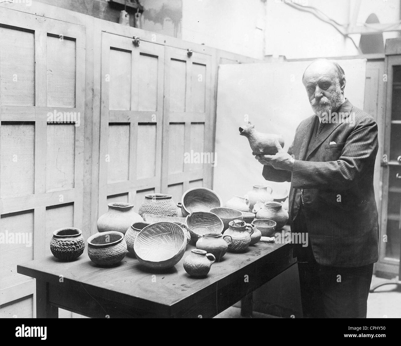 Jesse Walter Fewkes with archaeological discoveries of the Pueblo Indians, 1926 Stock Photo