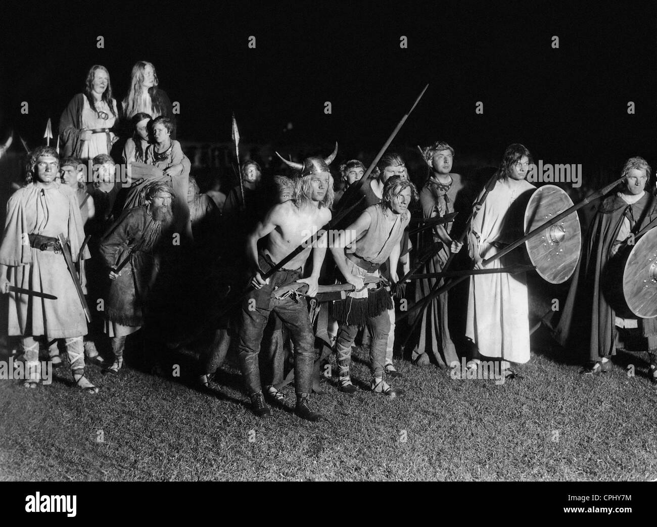 Masked youngsters during a summer solstice celebration, 1933 Stock Photo