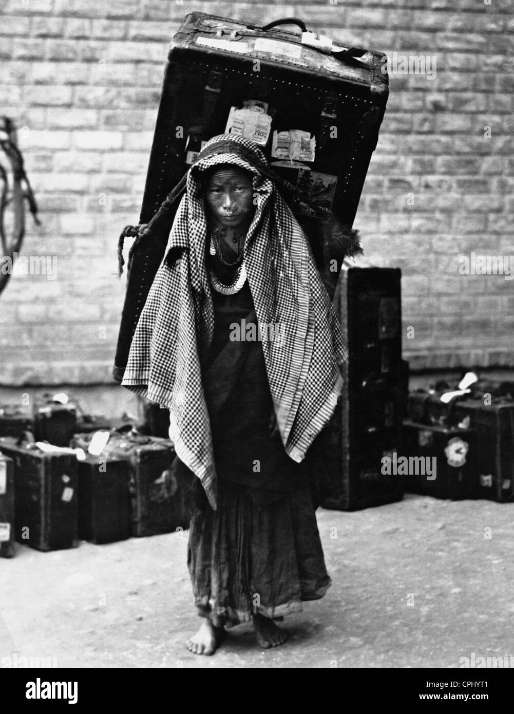 Luggage carrier in Darjeeling, 1930 Stock Photo