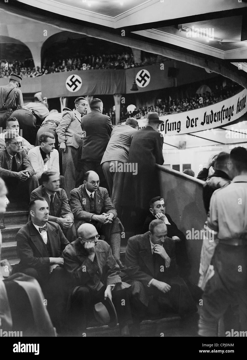 People listening at a Nazi event in the Berlin Sports Palace, 1935 Stock Photo