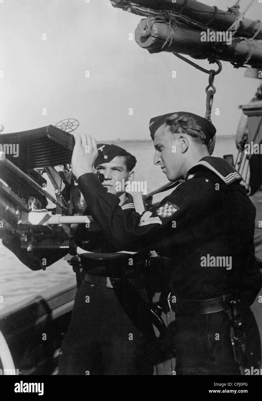 Croatian sailors at an anti-aircraft gun on a ship, 1942 Stock Photo