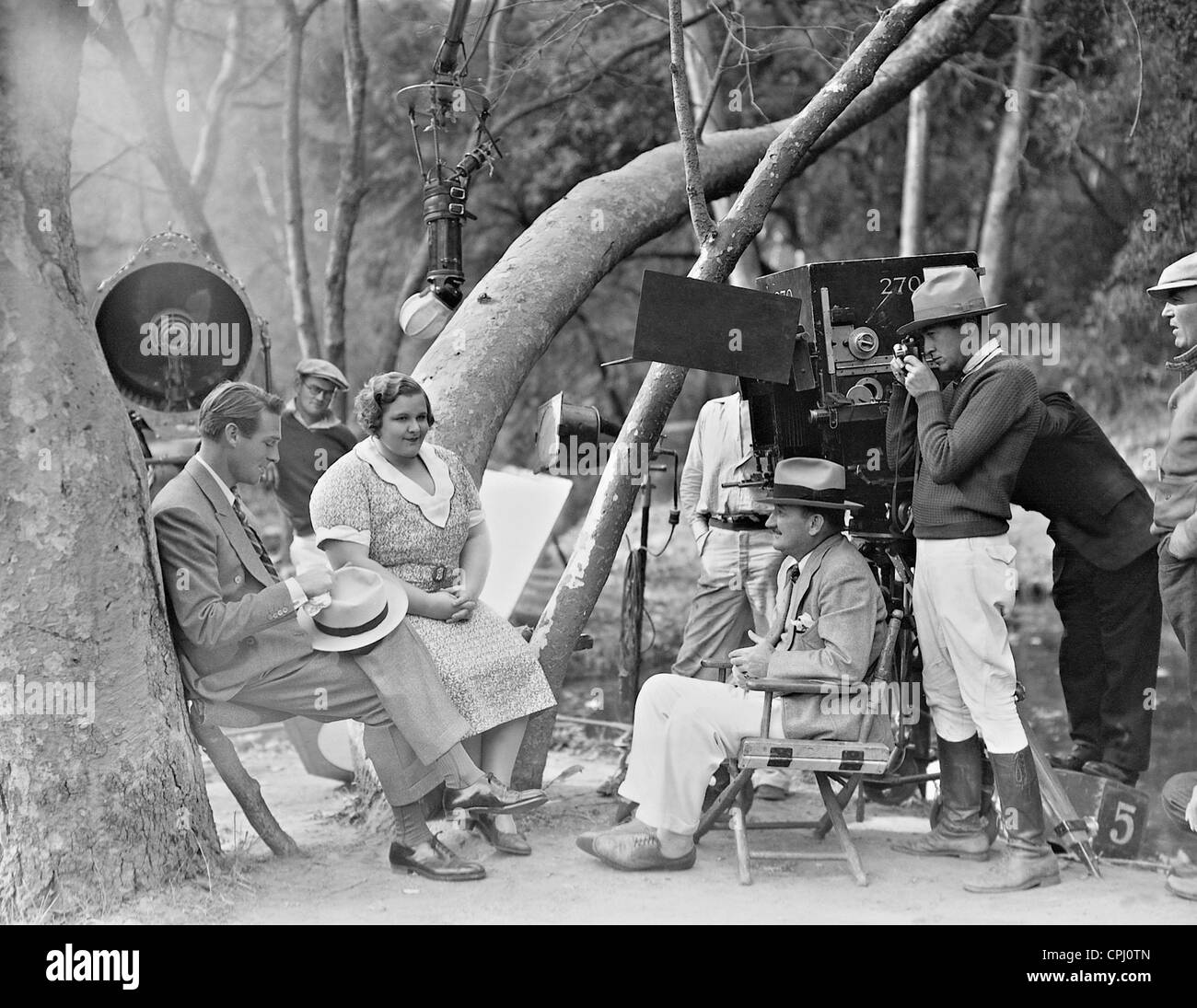 Randolph Scott, Kate Smith and William Seiter during filming of 'Hello, everybody!', 1929 Stock Photo