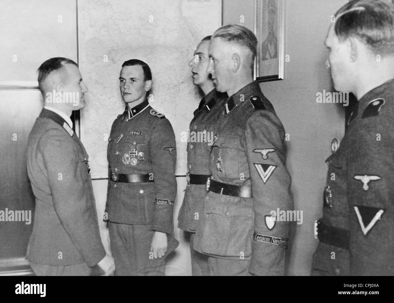 Ernst-Robert Grawitz with Dutch volunteers of the Waffen SS, 1943 Stock Photo