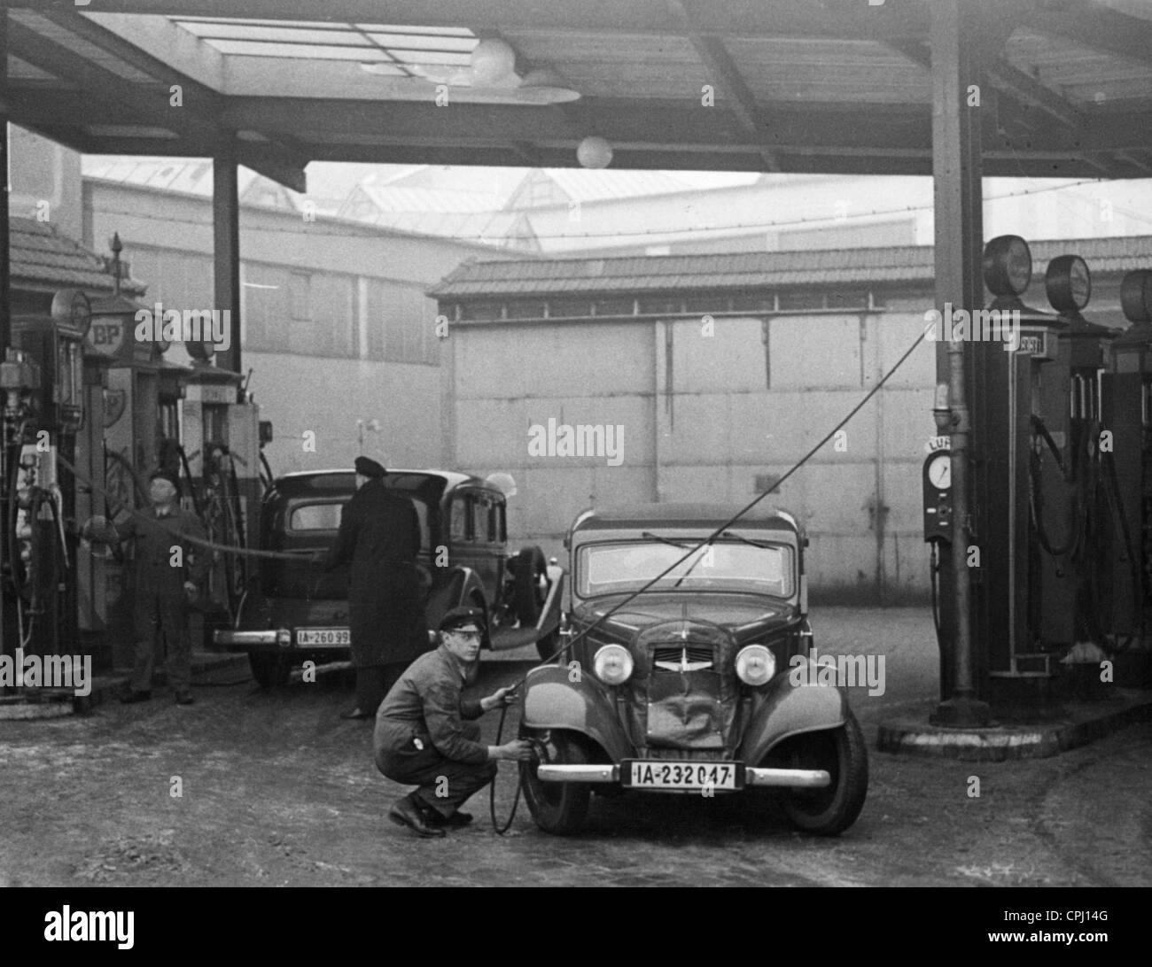 Gas station attendant Black and White Stock Photos & Images Alamy