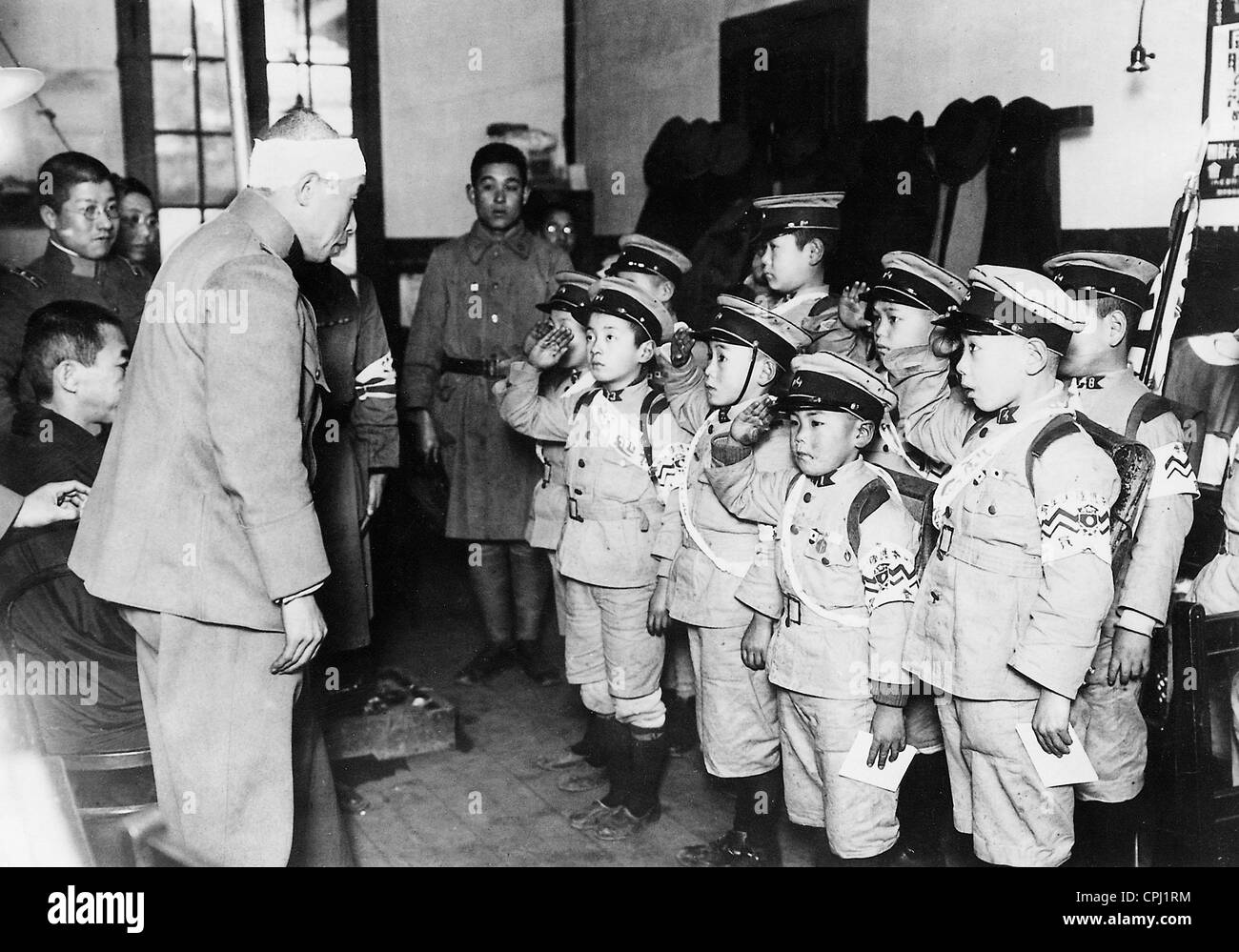 Japanese children in military uniform, 1933 Stock Photo