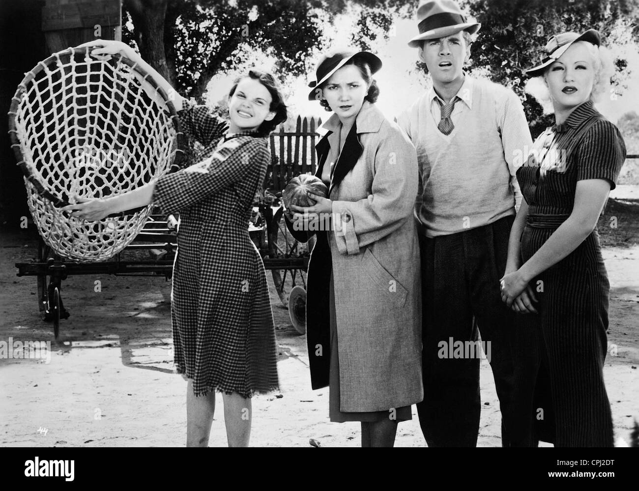 Judy Garland, Patsy Kelly, Johnny Downs and Betty Grable in 'The point', 1936 Stock Photo