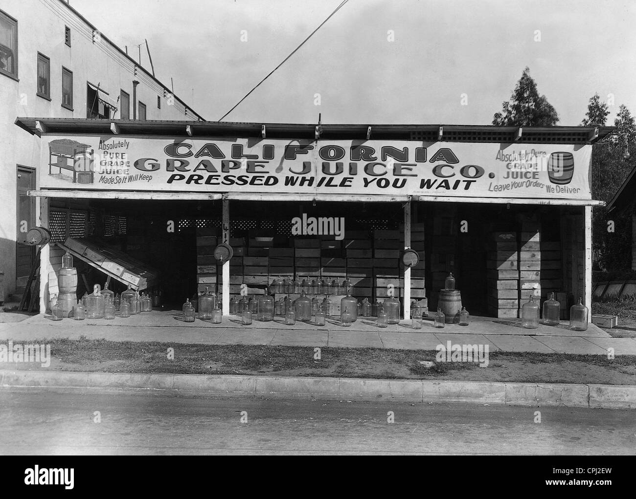 Grape juice sales point in Los Angeles, 1928 Stock Photo Alamy