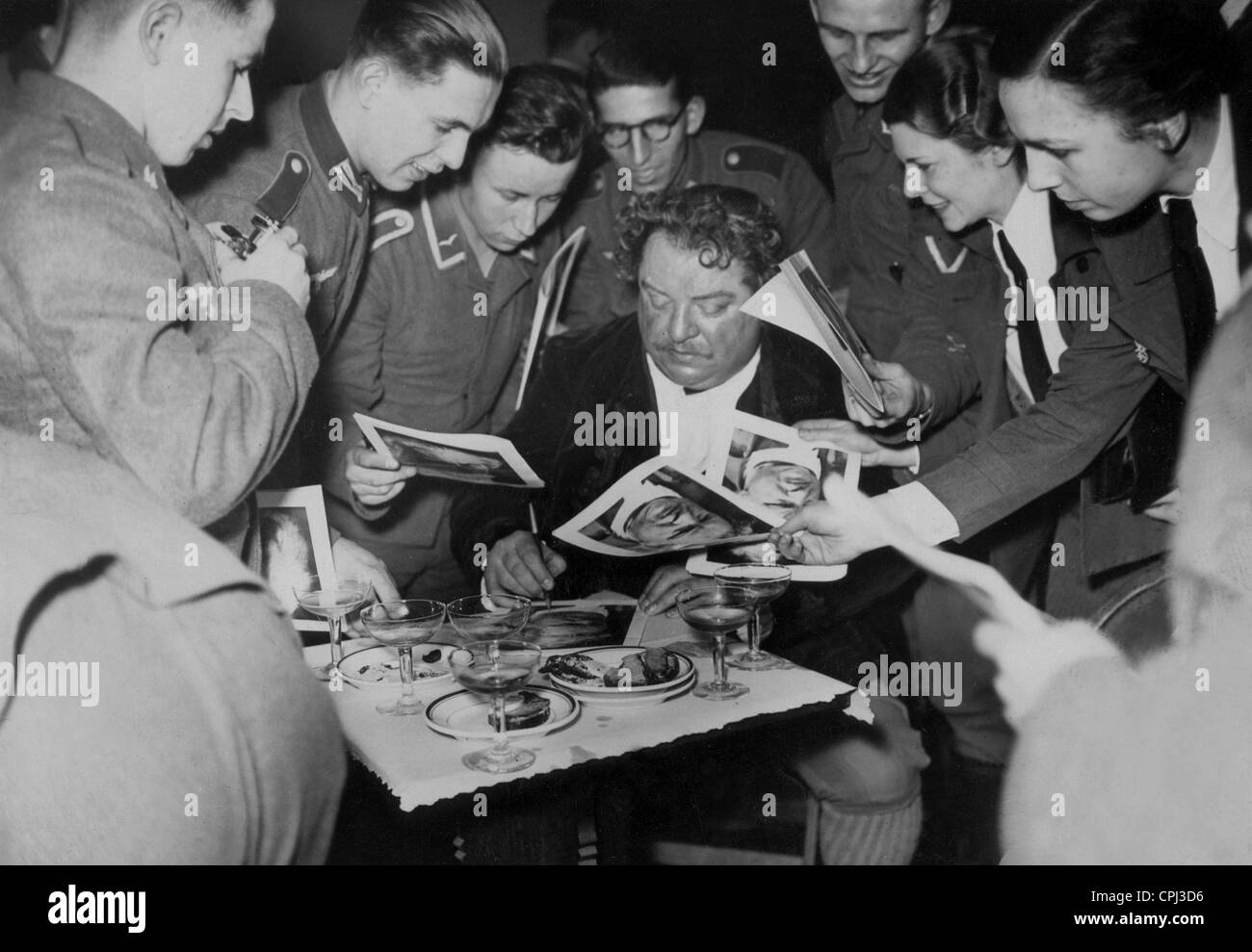 Heinrich George signs autographs, 1941 Stock Photo