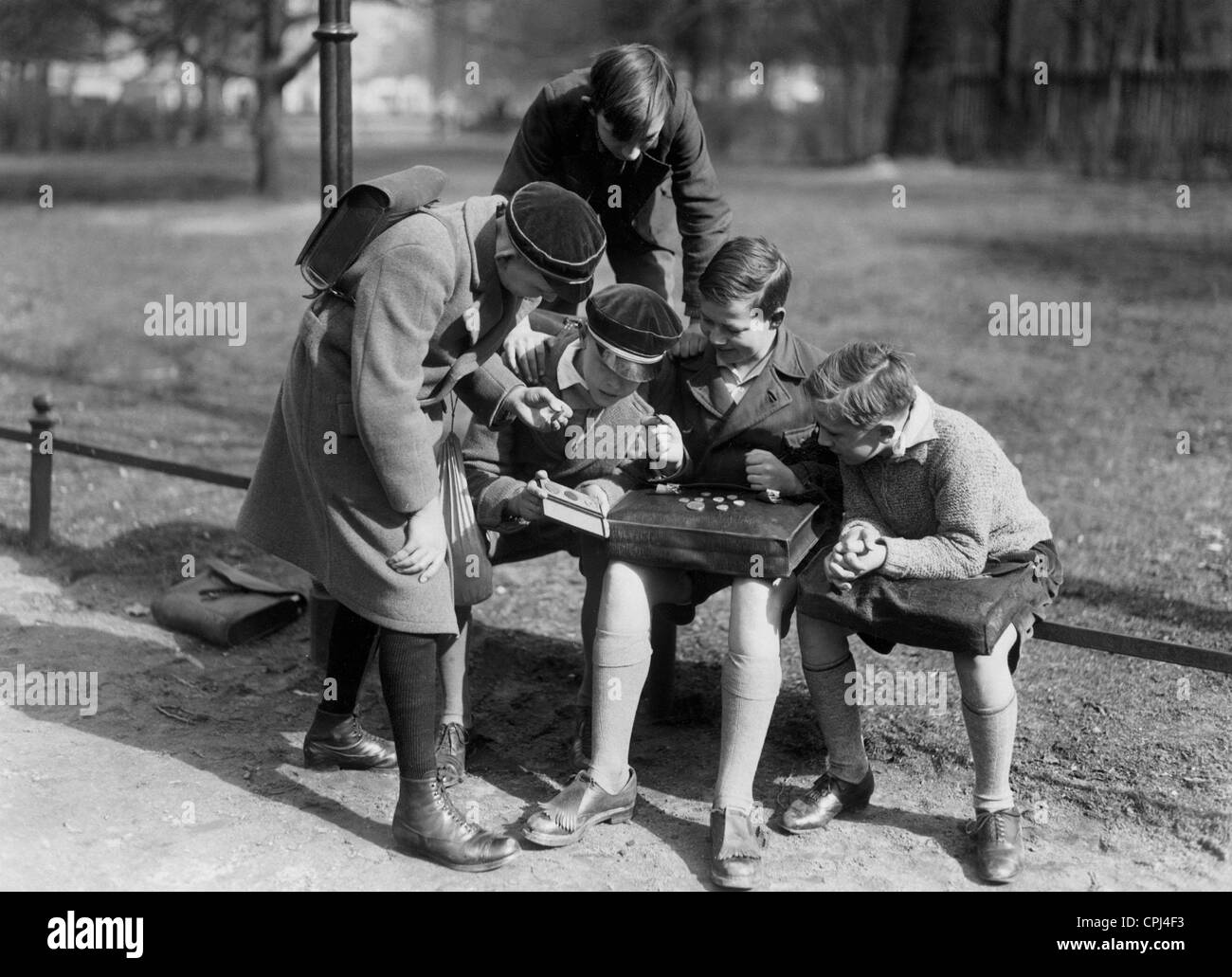Children Trading Coins 1932 Stock Photo Alamy
