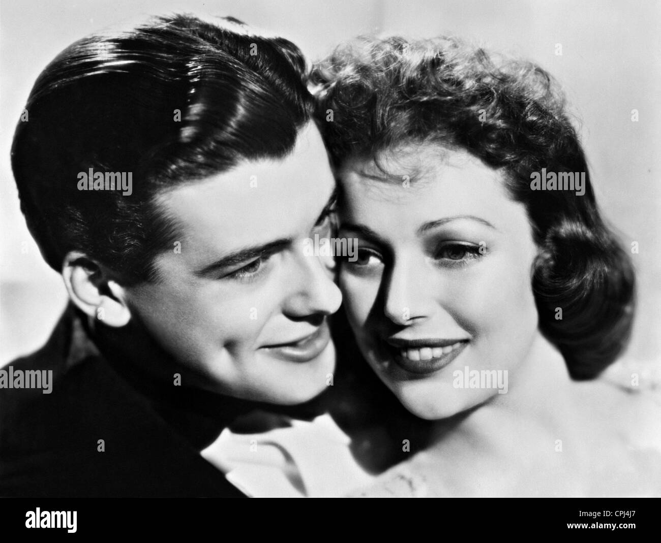 Richard Greene and Loretta Young in 'Four Men - and a Prayer', 1938 Stock Photo