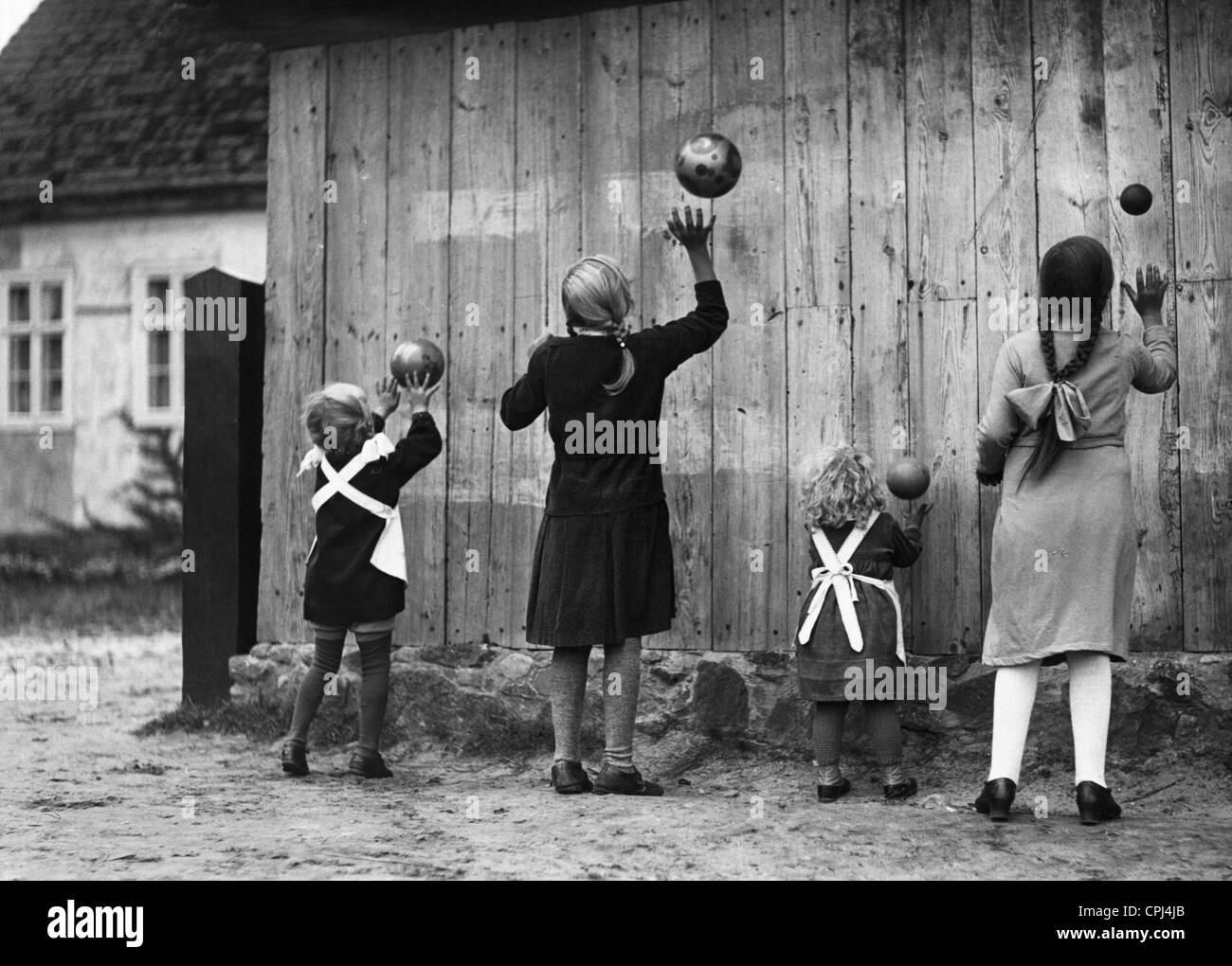 Girls playing ball, 1932 Stock Photo