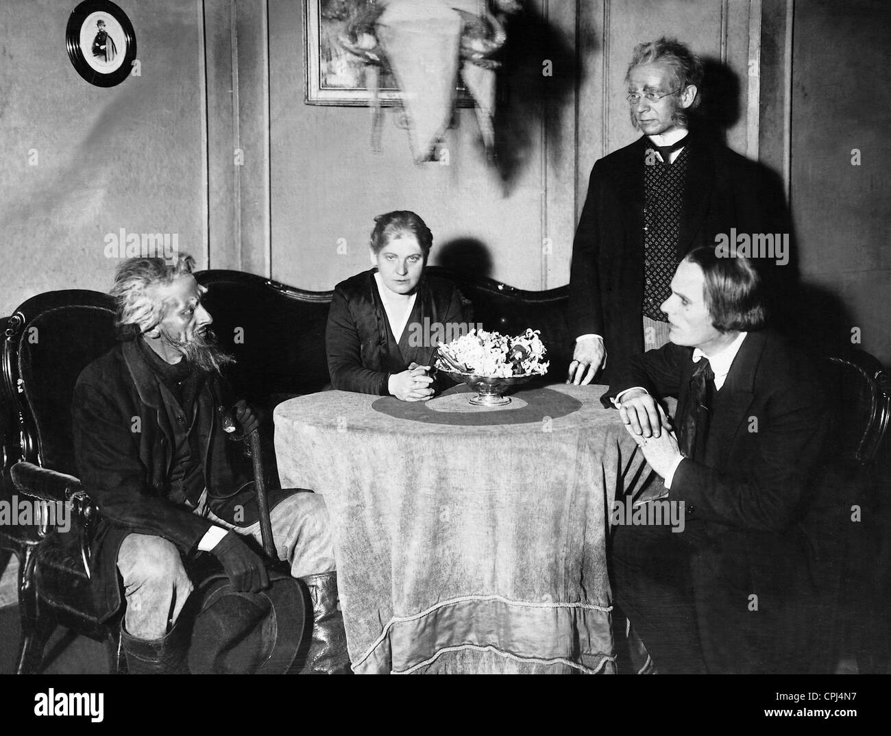Wilhelm Voelcker, Lucie Hoeflich, Ferdinand Gregori and Eduard von Winterstein in 'Rosmersholm', 1918 Stock Photo