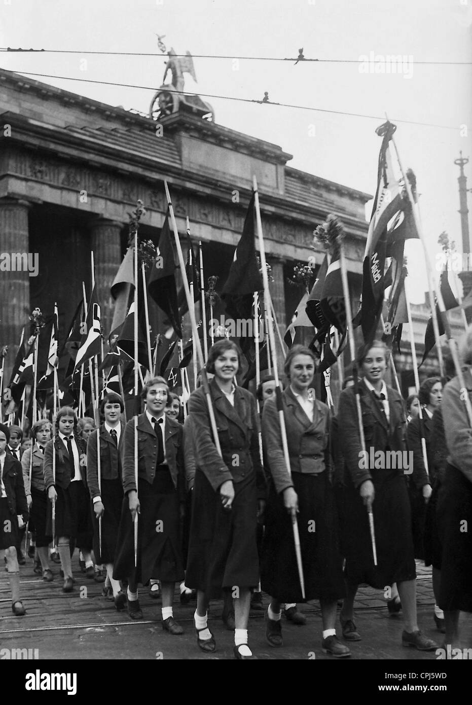 Flag parade of BDM girls at the Brandenburger Tor, 1937 Stock Photo
