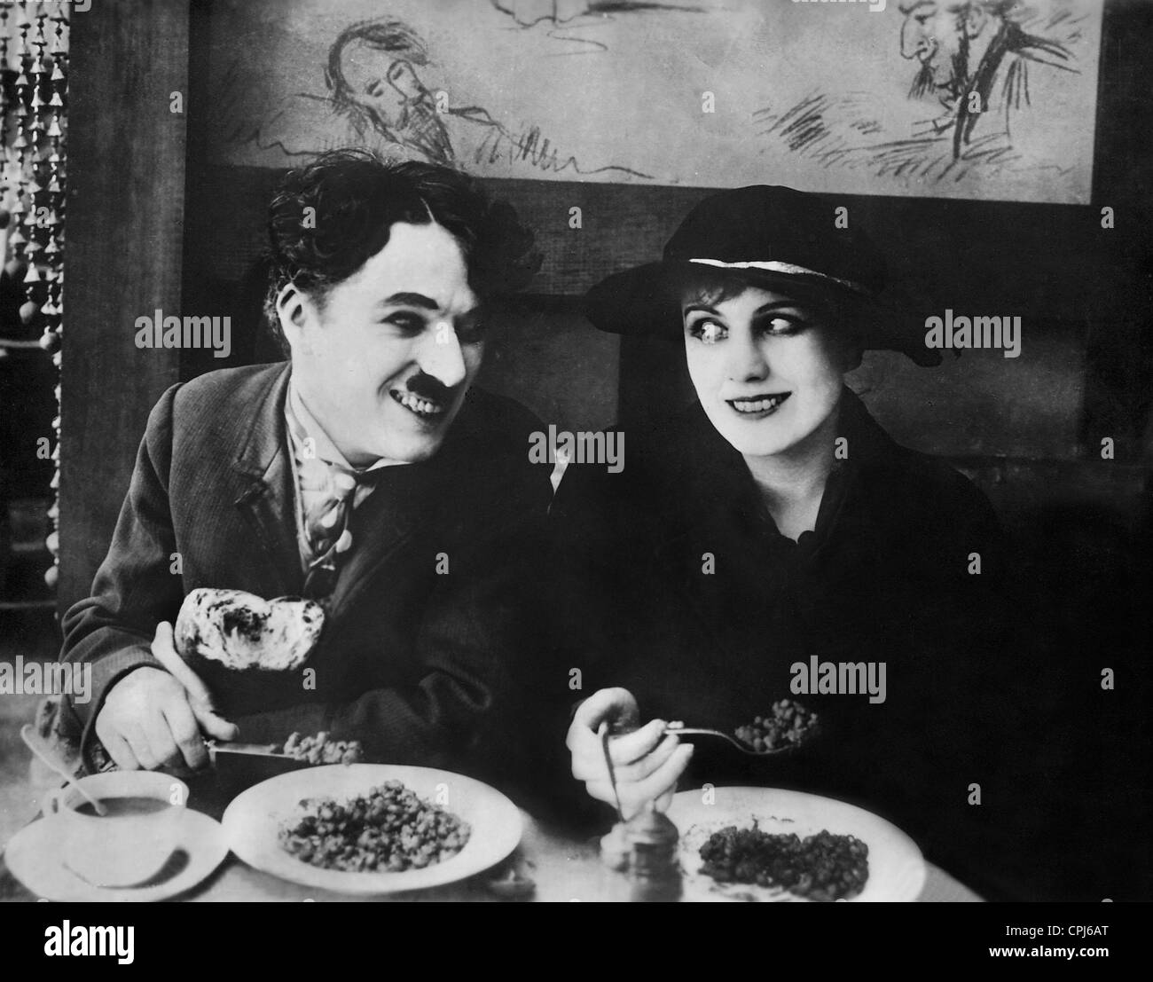 Charles Chaplin and Edna Purviance in 'The Immigrant', 1916 Stock Photo