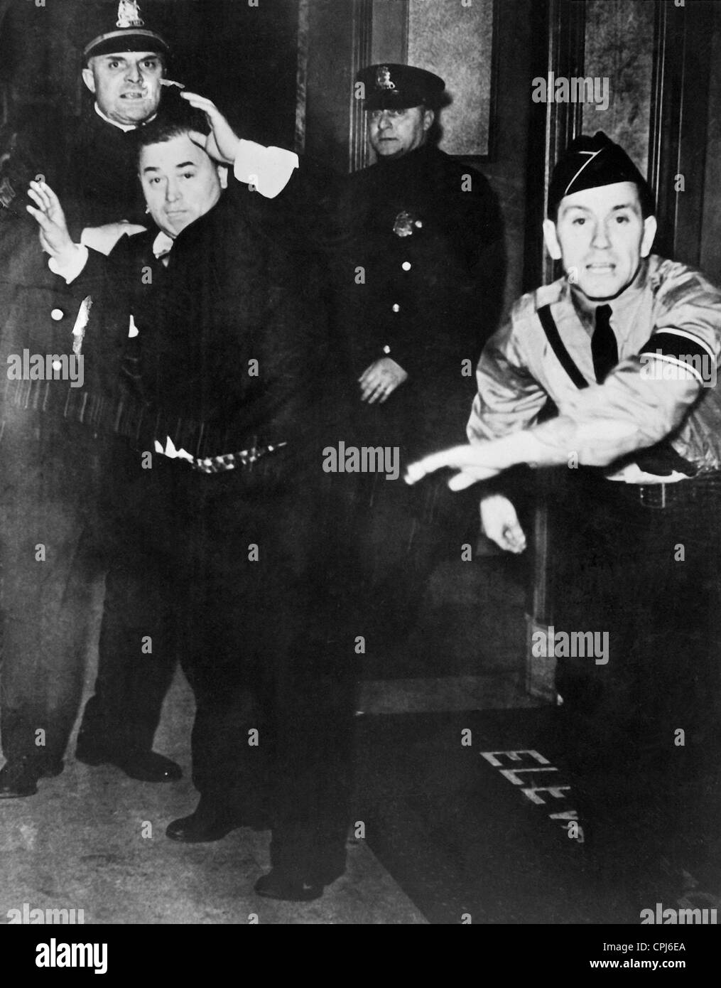 Heckler at the meeting of the German-American Bund taken into police custody, 1938 Stock Photo