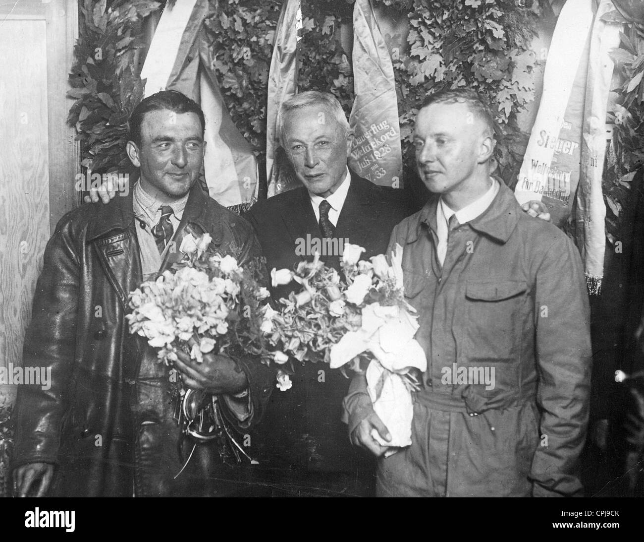 Wilhelm Zimmermann, Hugo Junkers and Johann Risticz after a duration flight record, 1928 Stock Photo