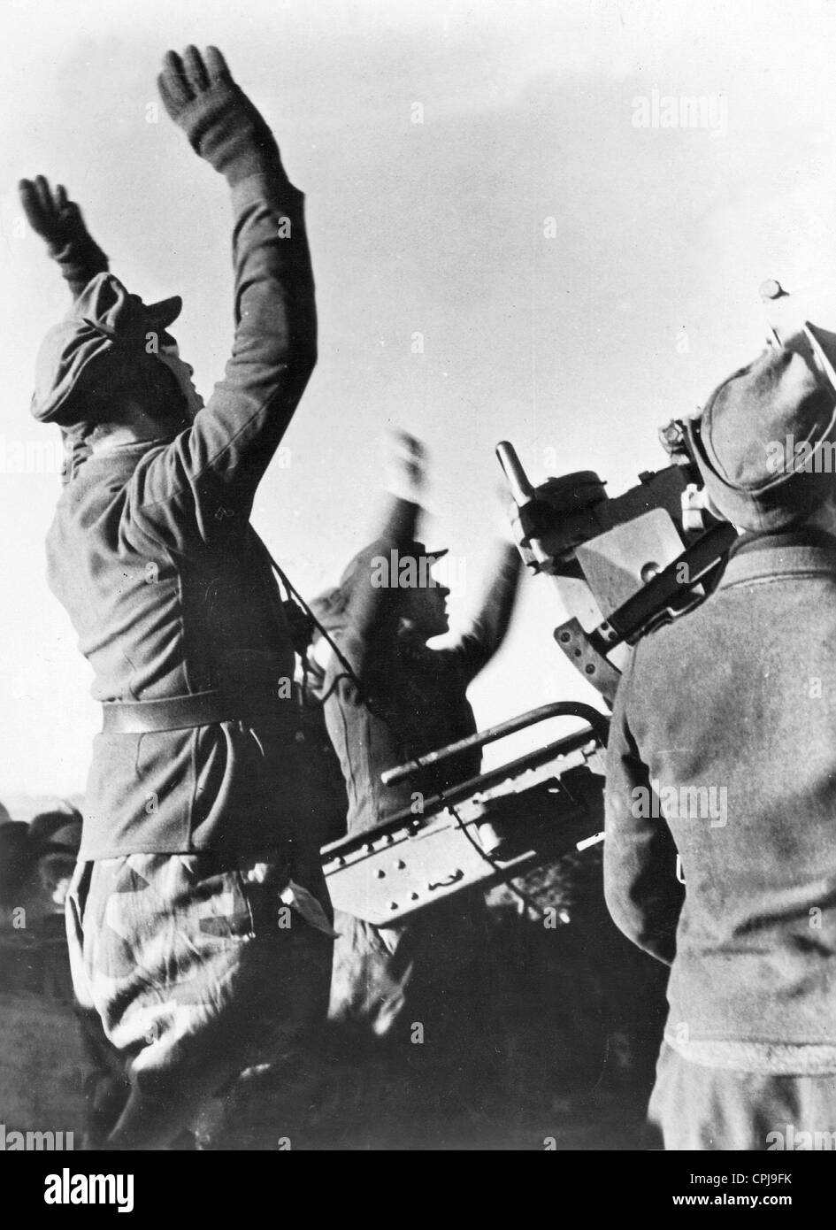 German Flak soldiers celebrate shooting down a Soviet airplane, 1945 Stock Photo