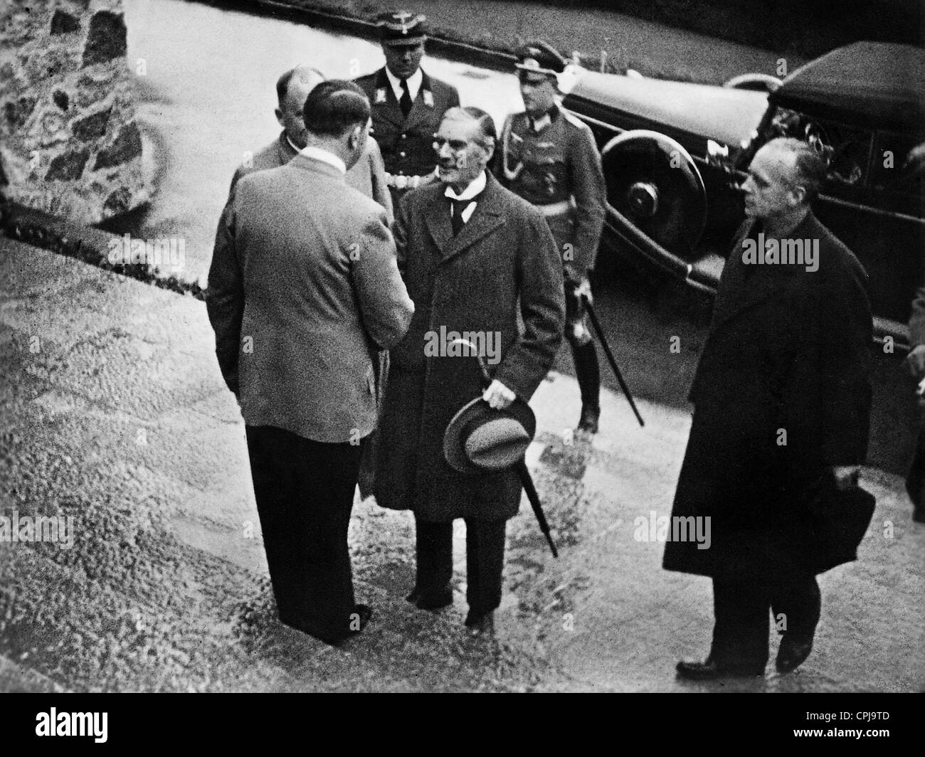 Adolf Hitler welcomes Neville Chamberlain, 1938 Stock Photo