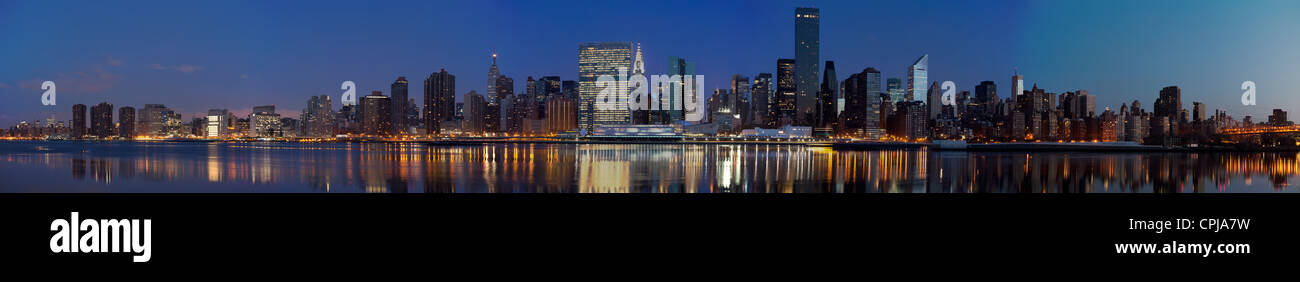 New York City skyline of Midtown Manhattan, viewed from Gantry Park in Brooklyn, New York City. Stock Photo