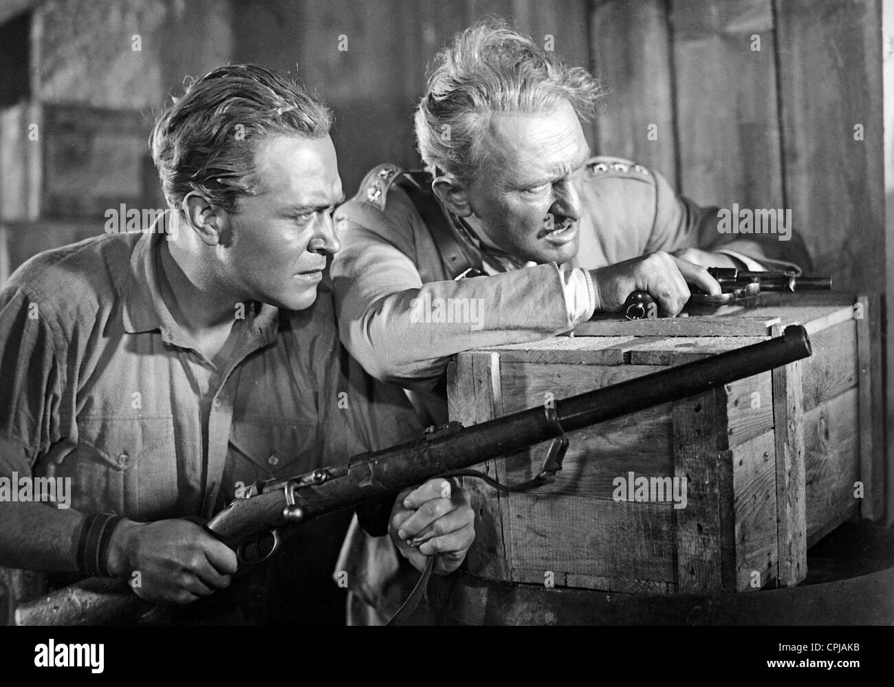 Gustav Froehlich and Peter Voss in 'Alarm in Peking', 1937 Stock Photo